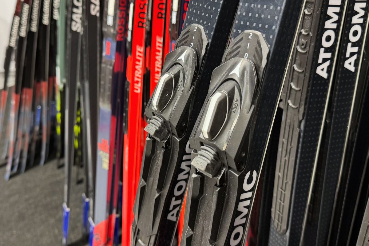 close up of bindings with skis behind