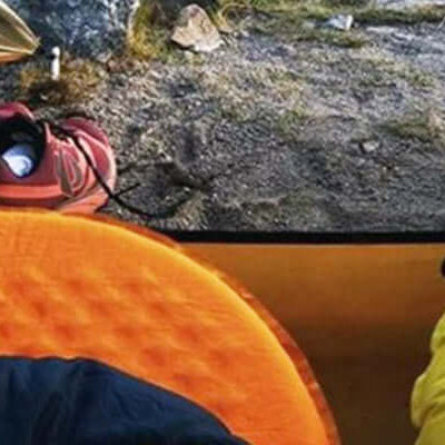 To freeze or not to freeze | R-value: Two camping mats inside a tent with shoes and gear near the entrance.