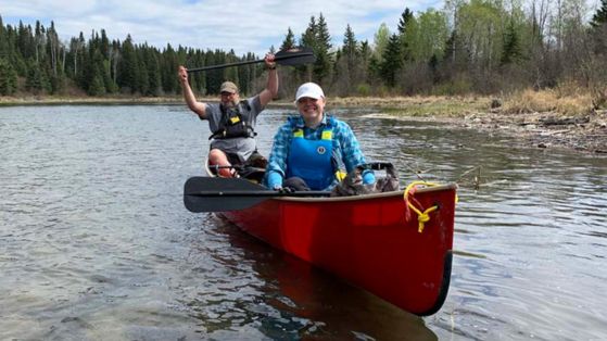 two people in a canoe