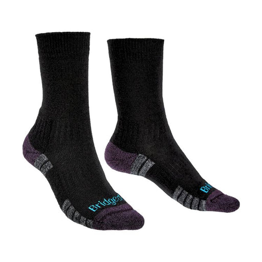 Pair of black socks with purple accents on a white background
