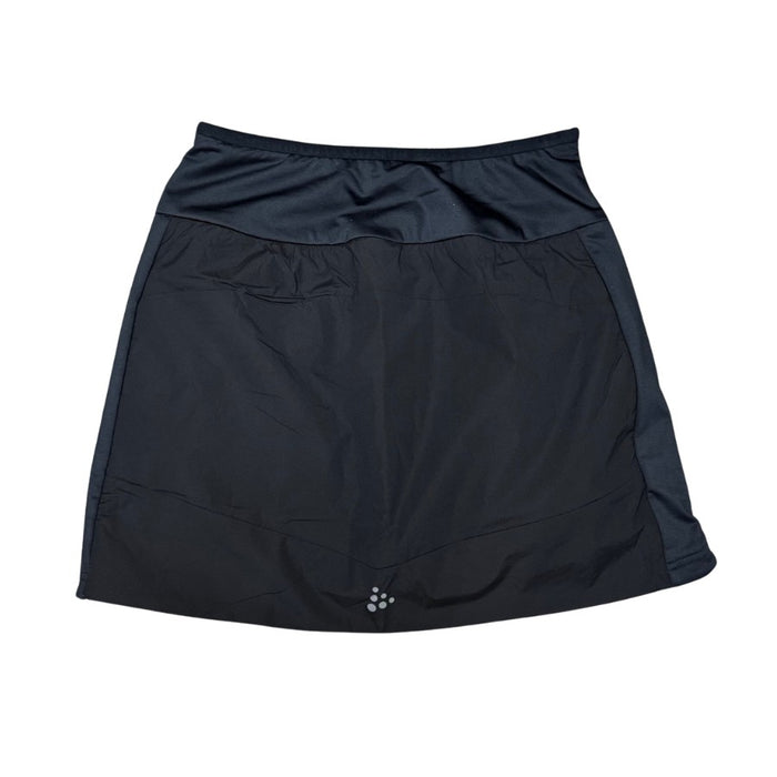 Black athletic skirt with a white background
