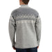A person shown from the back wearing a heather gray knit sweater with a cream-colored Fair Isle pattern across the shoulders and upper back, paired with dark blue jeans against a plain white background.