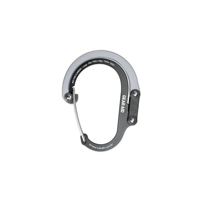 A silver and dark gray carabiner with white 'GEAR AID' branding, shown on a plain white background.