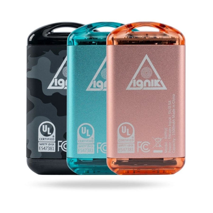 Three metal hand warmers in orange, teal and black against a white background.