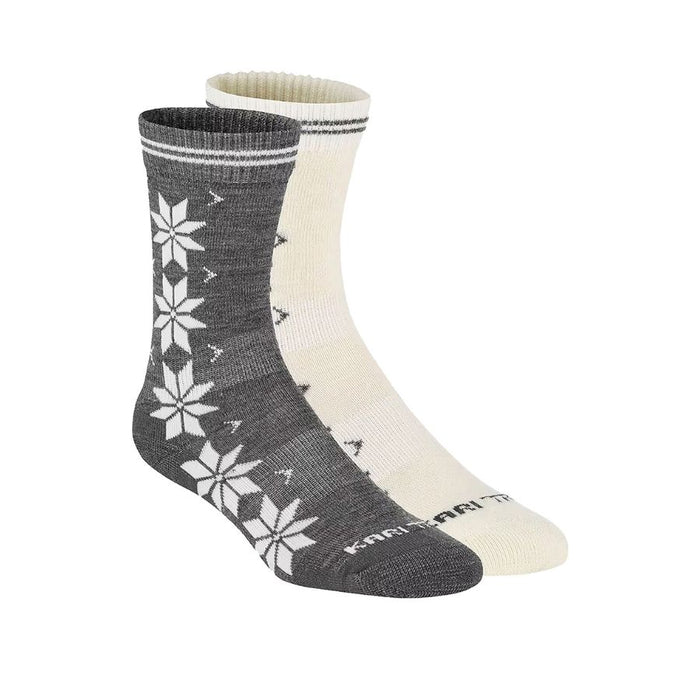 A pair of mid-calf socks shown on invisible forms against a white background. One sock is dark gray with a white Nordic snowflake pattern, and the other is cream with a gray patterned cuff.