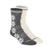 A pair of mid-calf socks shown on invisible forms against a white background. One sock is dark gray with a white Nordic snowflake pattern, and the other is cream with a gray patterned cuff.
