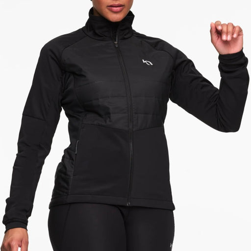 Person wearing a black jacket with a brand logo on a white background