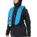 Person in black jacket wearing a blue PFD against a white background