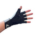 Black and gray glove on a person's hand against a white background