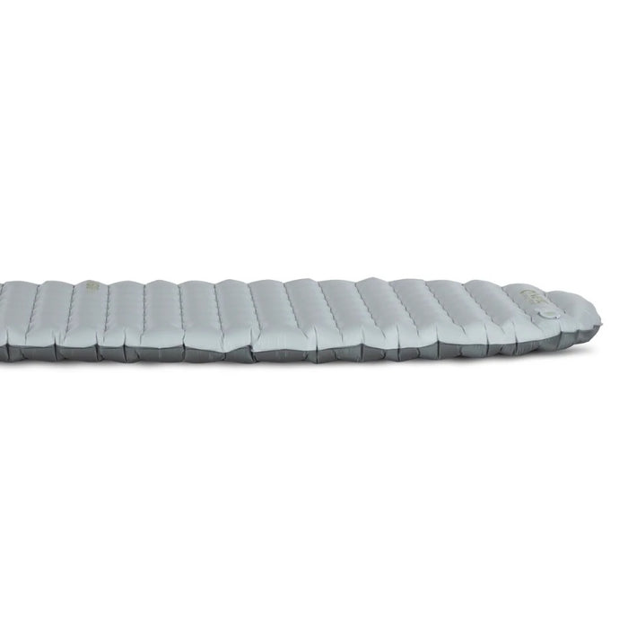 Light grey baffled sleeping pad against a white background