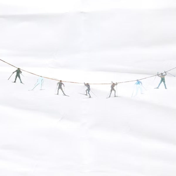 garland of skate skiers on a white background