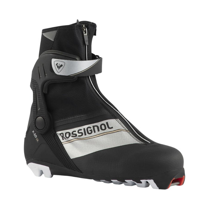 Black Rossignol ski boot on a white background