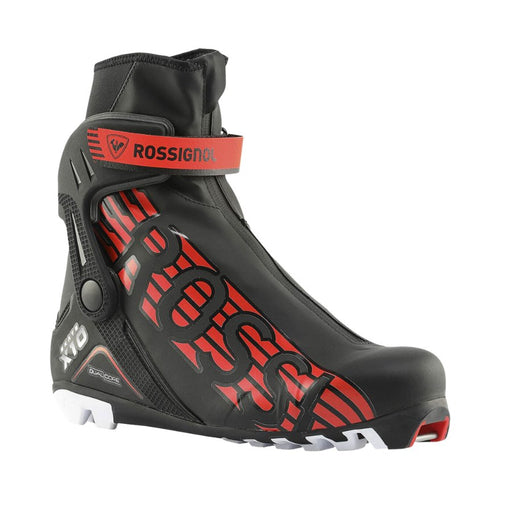 Black and red Rossignol ski boot on a white background