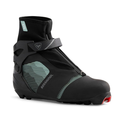 Black ski boot with visible branding on a white background