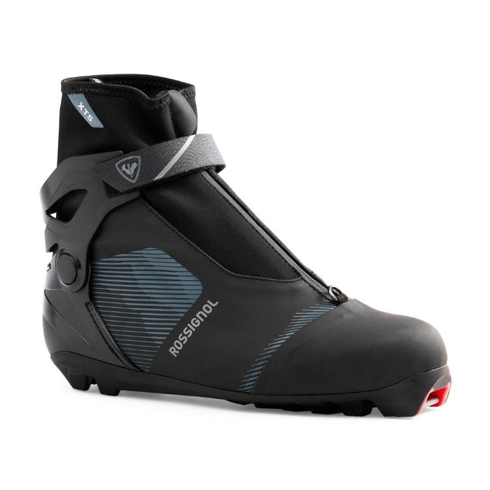 Black ski boot with gray accents on a white background
