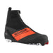 Black and orange Rossignol ski boot on a white background
