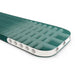 A teal green inflatable sleeping pad with a white reinforced edge and circular vent holes, shown on a clean white background.