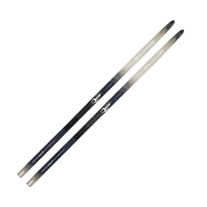 Beige and grey skis against a white background.