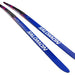 Blue and pink skis with Salomon branding against a white background.