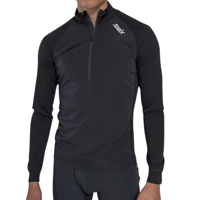 Black long-sleeve athletic shirt with a brand logo on a white background