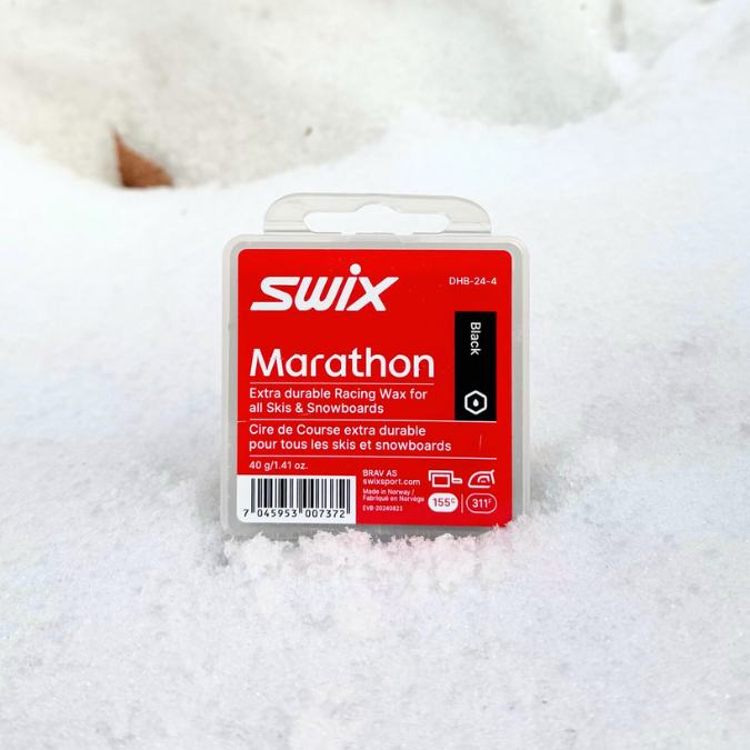 Swix Marathon wax packaging on a snowy background