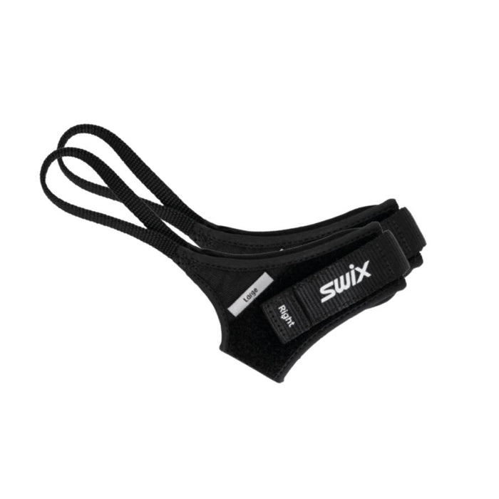 Pair of black ski pole straps with Swix branding against a white background.