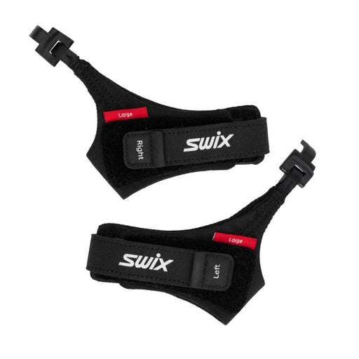 Two black ski pole straps with red tabs and Swix branding against a white background.