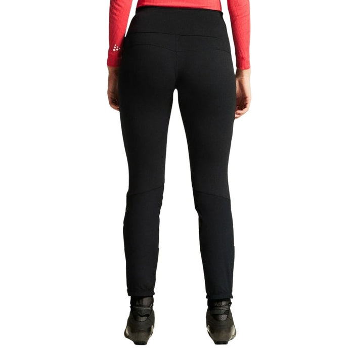 Black leggings worn by a person on a white background