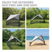 A four-panel collage showing a gray and black mesh outdoor bug-free tent set up in grassy forests, on a lawn, on a beach, with large text at the top reading 'ENJOY THE OUTDOORS BUG-FREE AND SUN-SAFE'.