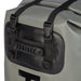 Close-up of a gray waterproof dry bag with black straps, plastic buckles, and a black plastic handle attachment panel.