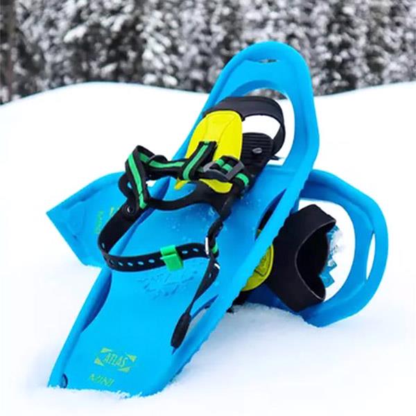 Atlas mini snowshoes in the snow 